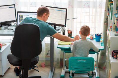 Parent with child learning about council tax online