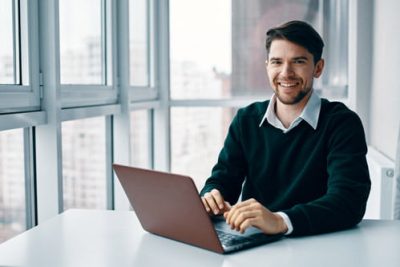 Taxpayer using a laptop to calculate their tax refund